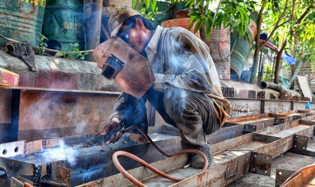 container drums, craft, dirty, heat, industry, iron, manual labor, production, shield, steel, steel trusses, torch, traditional, welder, welding machine, work, worker, manual labor, manual labor, welder, welder, welder, welder, welder, welding machine, welding machine
