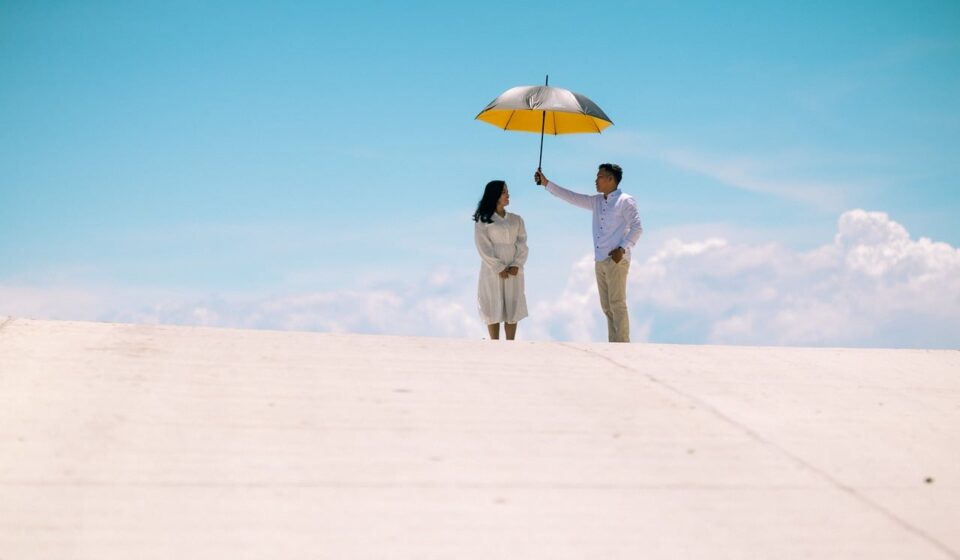 couple, umbrella, sun, white clothing, summer sky, romance, landscape, clear sky, serenity, lovers, bright colors, two people, blue sky, distance, silhouette, man, nature, woman, beautiful day, blue dress, yellow